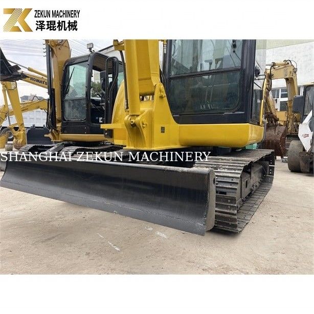Komatsu PC56-7 مینی حفاری با وزن عملیاتی 5 تن و موتور دیزل با دوام